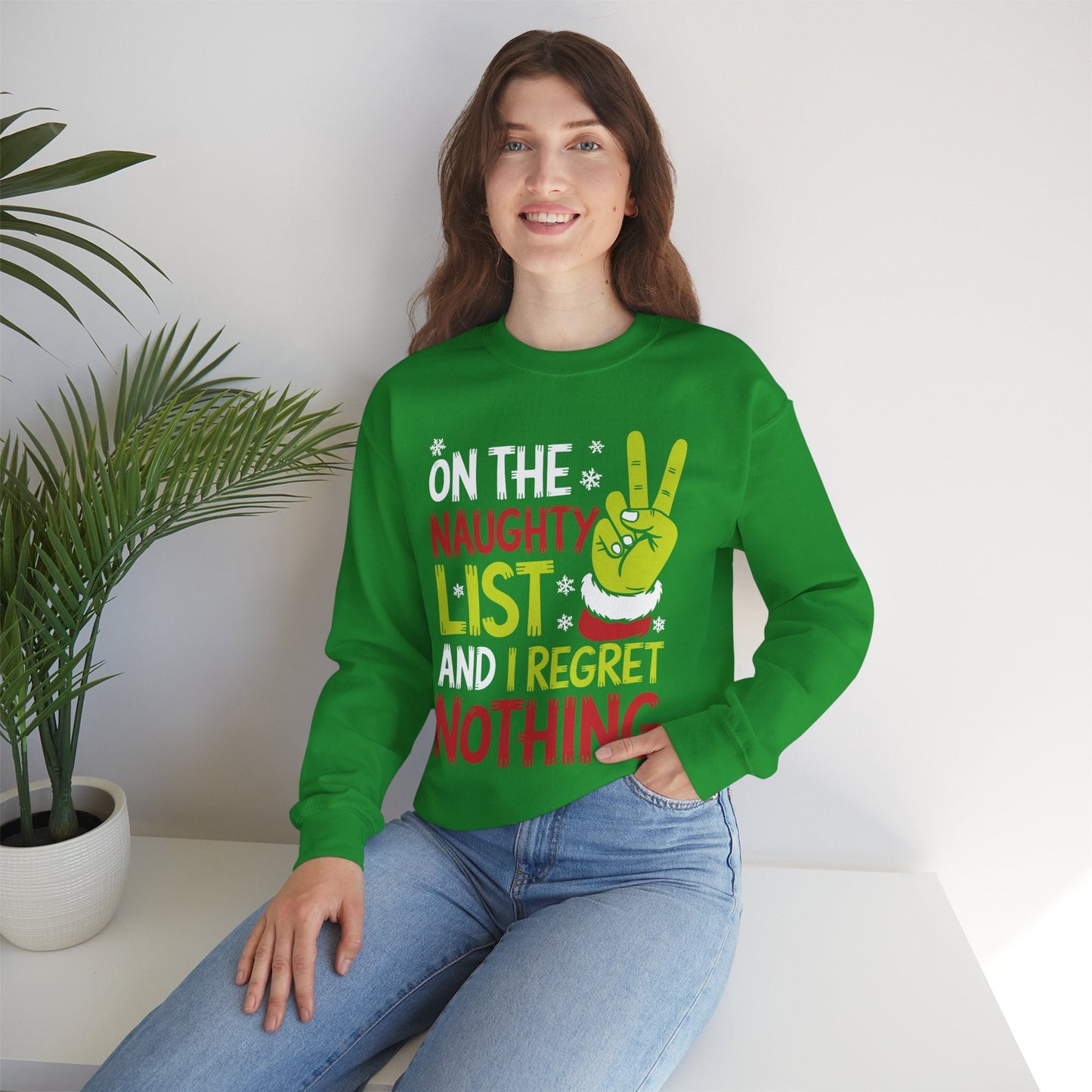 On The Naughty List And I Regret Nothing Funny Christmas Sweatshirt