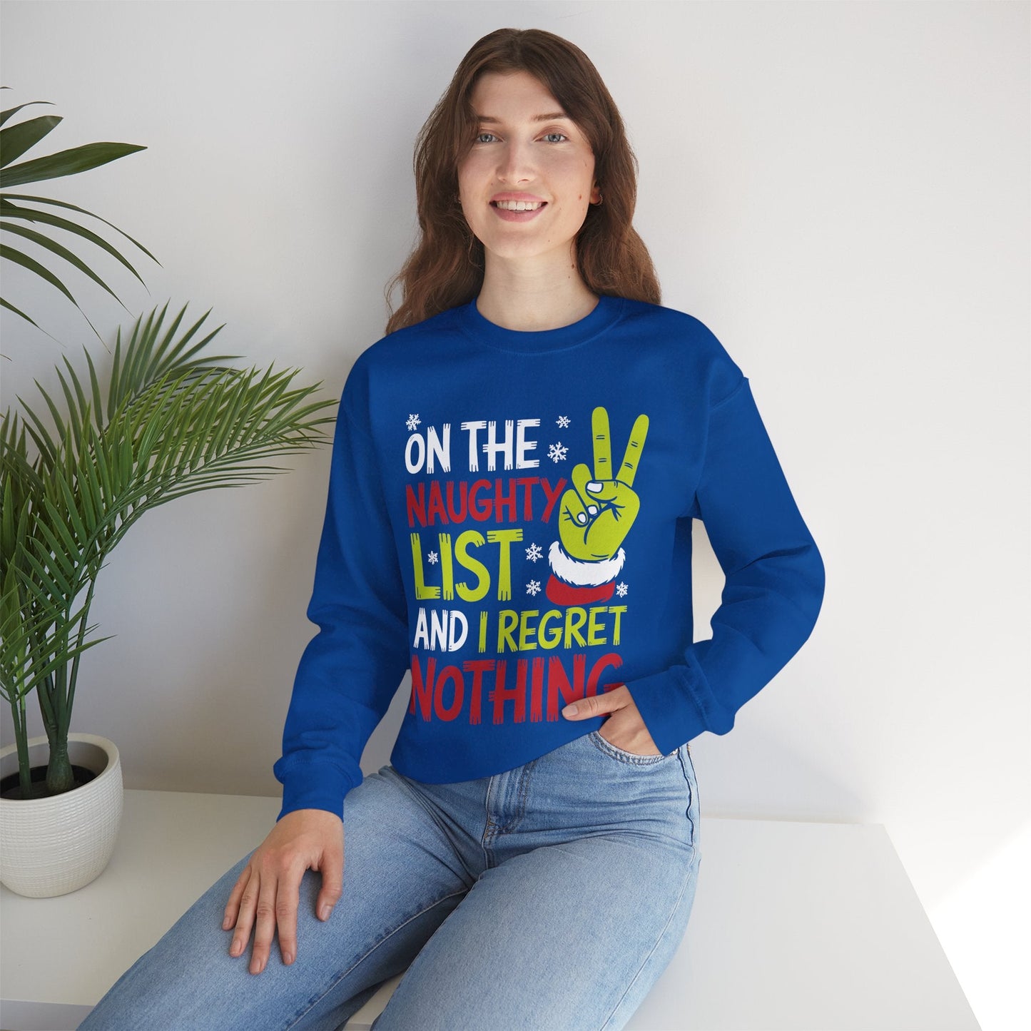 On The Naughty List And I Regret Nothing Funny Christmas Sweatshirt