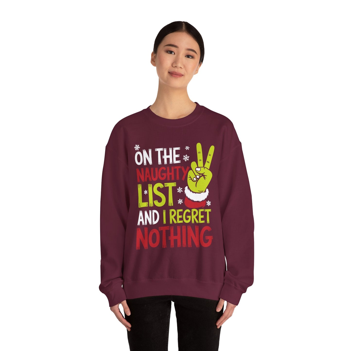 On The Naughty List And I Regret Nothing Funny Christmas Sweatshirt